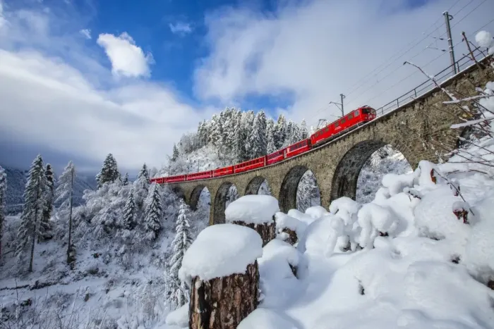 Framed Print : Bernina Express passes through the snowy woods around Filisur, Canton of Grisons (Graubunden) Framed Print : Bernina Express passes through the snowy woods around Filisur, Canton of Grisons (Graubunden)