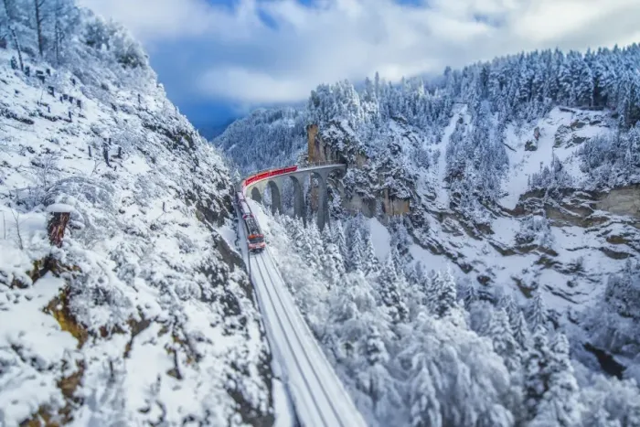 Framed Print : Bernina Express passes through the snowy woods around Filisur, Canton of Grisons (Graubunden) Framed Print : Bernina Express passes through the snowy woods around Filisur, Canton of Grisons (Graubunden)