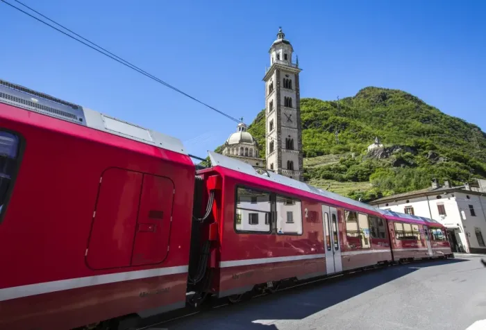 Framed Print : The Bernina Express train passes near the Sanctuary of Madonna di Tirano, not far Framed Print : The Bernina Express train passes near the Sanctuary of Madonna di Tirano, not far