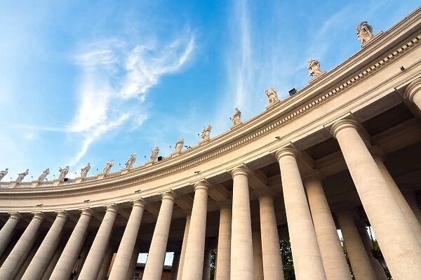 Berninis 17th century colonnade and statues of saints, St. Peters Square, Vatican City