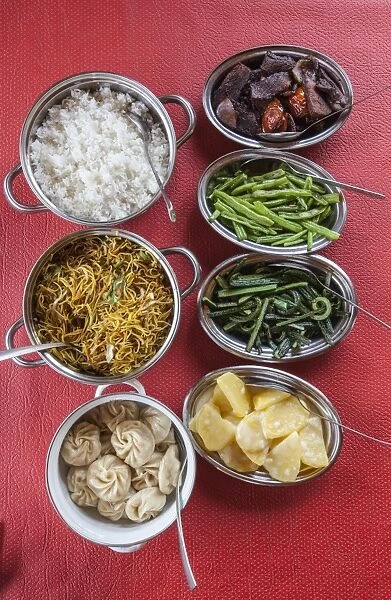 Bhutanese dishes served at a restaurant in Thimphu rice and vegetables including chilli