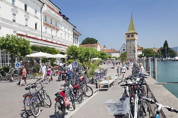 Bicycles at the promenade with the Mangturm tower, Lindau, Lake Constance, Bavaria, Germany, Europe
