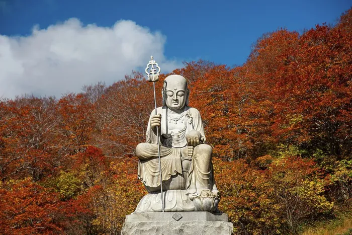 Framed Print : Big shizo statue in front of fire red autumnal leaves at beautiful Japanese temple surrounded by autumn colors, Osorezan Bodaiji Temple, Mutsu, Aomori prefecture, Honshu, Japan, Asia Framed Print : Big shizo statue in front of fire red autumnal leaves at beautiful Japanese temple surrounded by autumn colors, Osorezan Bodaiji Temple, Mutsu, Aomori prefecture, Honshu, Japan, Asia