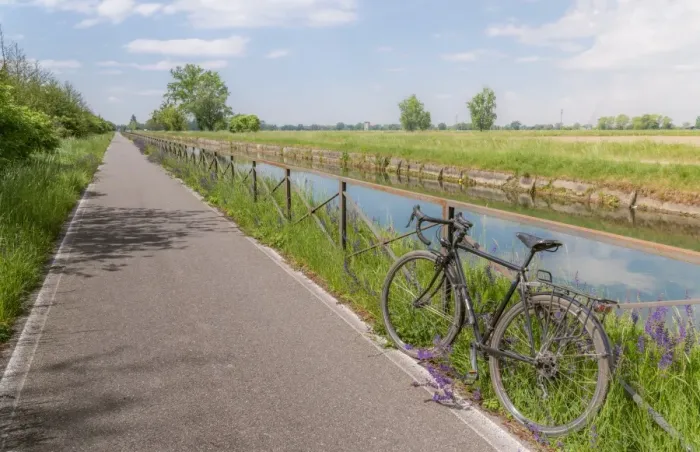 Framed Print : A bike on the rail of the Naviglio Pavense canal which links Milan to Pavia which Framed Print : A bike on the rail of the Naviglio Pavense canal which links Milan to Pavia which