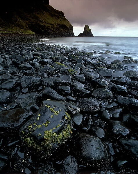 Black boulder rocks in Talisker Bay
