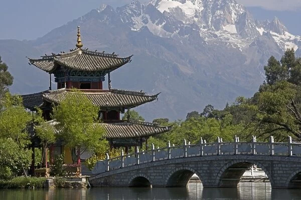 Black Dragon Pool Park, temple and bridge, with Jade Dragon Snow Mountain in background