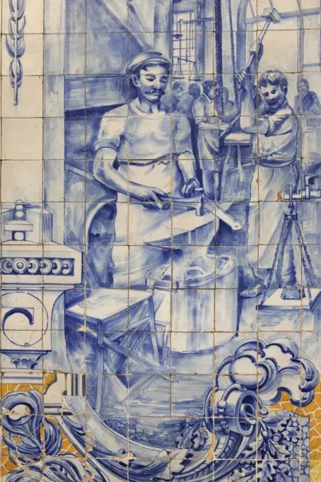 Framed Print : A blacksmiths workshop depicted on traditional Portuguese Azulejo tiles on a building in Alfama, Lisbon, Portugal, Europe