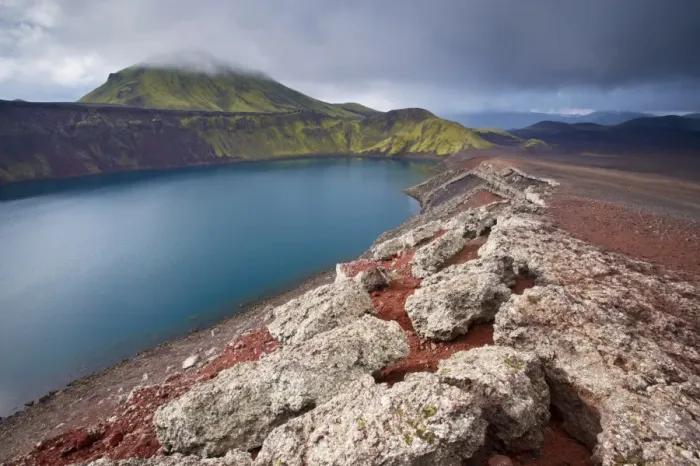 Framed Print : Blahylur crater lake in the Landmannalaugar area, Tjorvafell, 843 m in the distance Framed Print : Blahylur crater lake in the Landmannalaugar area, Tjorvafell, 843 m in the distance