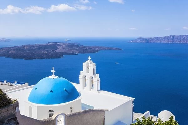 Blue dome and bell tower above Aegean Sea, St. Gerasimos church, Firostefani, Fira, Santorini (Thira), Cyclades Islands, Greek Islands, Greece, Europe
