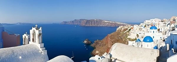 Blue domed churches in the village of Oia, Santorini (Thira), Cyclades Islands