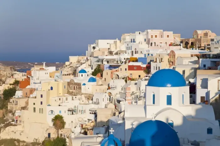 Framed Print : Blue domed churches in the village of Oia, Santorini (Thira), Cyclades Islands Framed Print : Blue domed churches in the village of Oia, Santorini (Thira), Cyclades Islands
