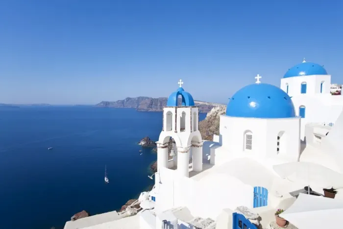 Framed Print : Blue domed churches in the village of Oia, Santorini (Thira), Cyclades Islands Framed Print : Blue domed churches in the village of Oia, Santorini (Thira), Cyclades Islands