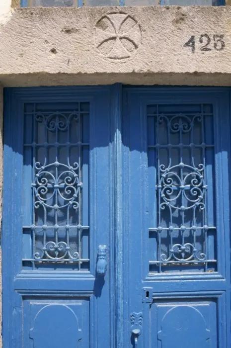 Framed Print : Detail of blue door with Greek cross above Framed Print : Detail of blue door with Greek cross above