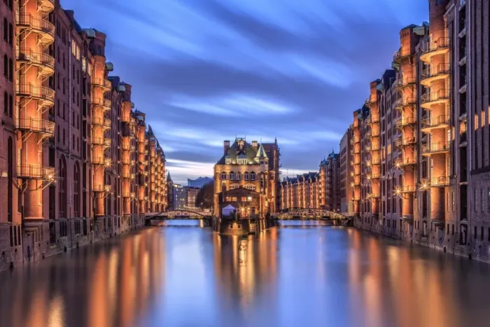 Framed Print : Blue dusk and lights are reflected in Poggenmohlenbrucke with water castle between bridges Framed Print : Blue dusk and lights are reflected in Poggenmohlenbrucke with water castle between bridges