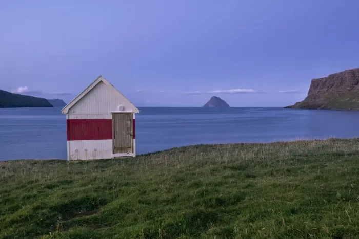 Framed Print : Blue hour at a small wooden house by the sea on Suduroy, Faroe Islands, Denmark, Europe
