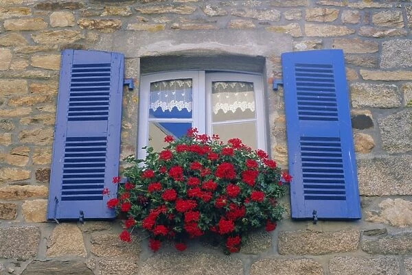 Blue shuttered windows and red flowers, Concarneau, Finistere, Brittany, France, Europe