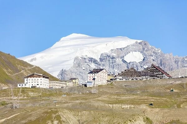 Blue sky frames the snowy peak of Mount Ortles at Stelvio Pass, Valtellina, Lombardy