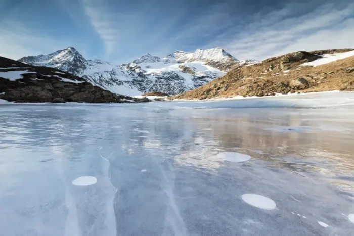 Framed Print : Blue sky on the frozen Lej Nair surrounded by snowy peaks, Bernina Pass, Canton of Graubunden Framed Print : Blue sky on the frozen Lej Nair surrounded by snowy peaks, Bernina Pass, Canton of Graubunden