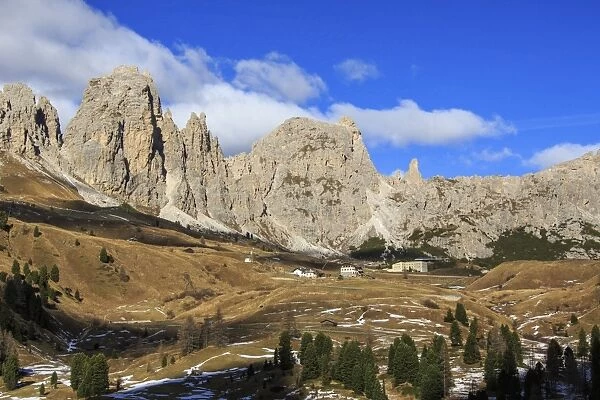 Blue sky on the rocky peaks and typical autumn landscape at Gardena Pass, South Tyrol