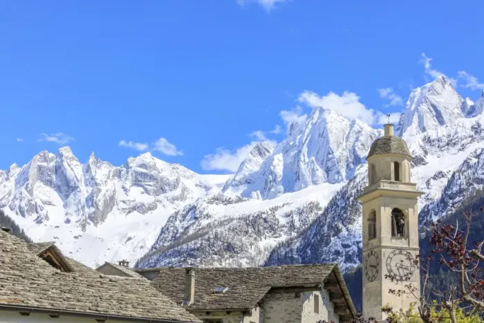 Framed Print : Blue sky in spring on bell tower and stone roofs, Soglio, Maloja, Bregaglia Valley Framed Print : Blue sky in spring on bell tower and stone roofs, Soglio, Maloja, Bregaglia Valley