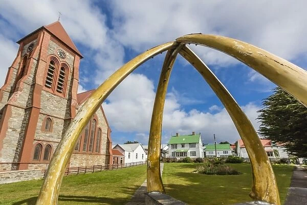 Blue whale lower jawbones form an arch in front of the Anglican Church, Stanley, Falklands, UK Overseas Protectorate, South America