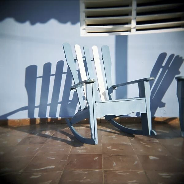 Blue and white chair outside house, Vinales, Cuba, West Indies, Central America