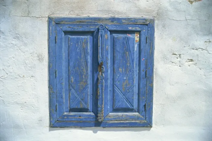 Framed Print : Blue window shutters and white walls Framed Print : Blue window shutters and white walls