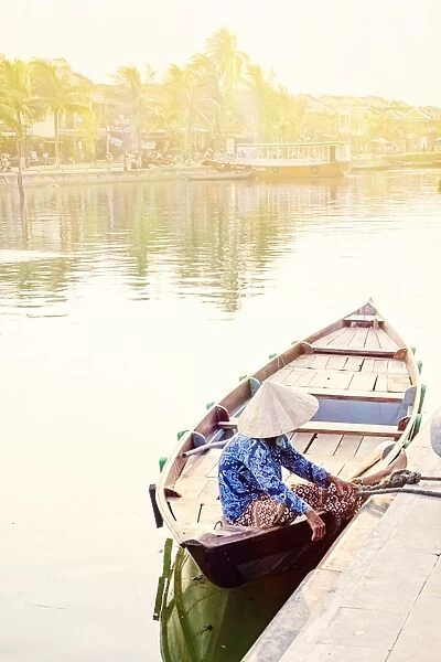 A boat driver in a conical hat in Hoi An, Vietnam, Indochina, Southeast Asia, Asia