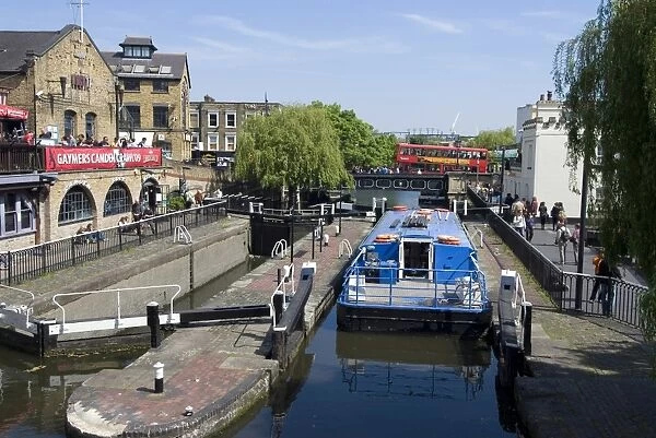 Boat going through Camden Lock, London, England, United Kingdom, Europe