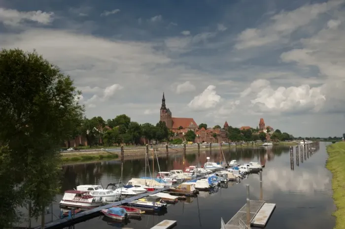 Framed Print : Boat harbour on the Elbe River below walls of historical town of Tangermunde Framed Print : Boat harbour on the Elbe River below walls of historical town of Tangermunde