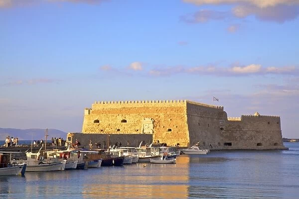 The boat lined Venetian Harbour and Fortress, Heraklion, Crete, Greek Islands, Greece