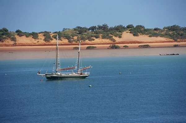 Boat moored offshore at Broome, Kimberley, Western Australia, Australia, Pacific