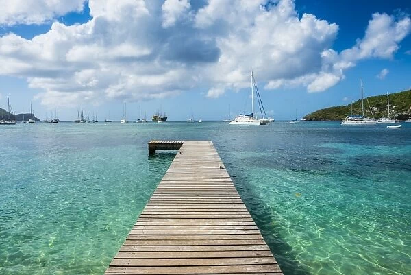 Boat pier in the turquoise waters of Admiralty Bay, Bequia, The Grenadines, St. Vincent and the Grenadines, Windward Islands, West Indies, Caribbean, Central America