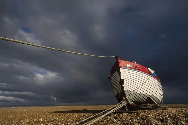 Boat on shingle beach, Dungeness, Kent, England, United Kingdom, Europe