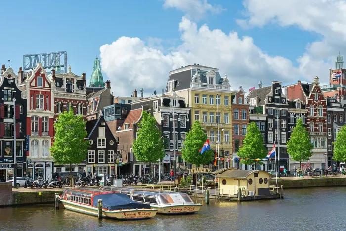 Framed Print : Boats on Amstel River, Amsterdam, The Netherlands, Europe Framed Print : Boats on Amstel River, Amsterdam, The Netherlands, Europe