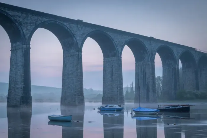 Framed Print : Boats beneath St. Germans Victorian viaduct at dawn, St. Germans in Cornwall, England, United Kingdom, Europe Framed Print : Boats beneath St. Germans Victorian viaduct at dawn, St. Germans in Cornwall, England, United Kingdom, Europe