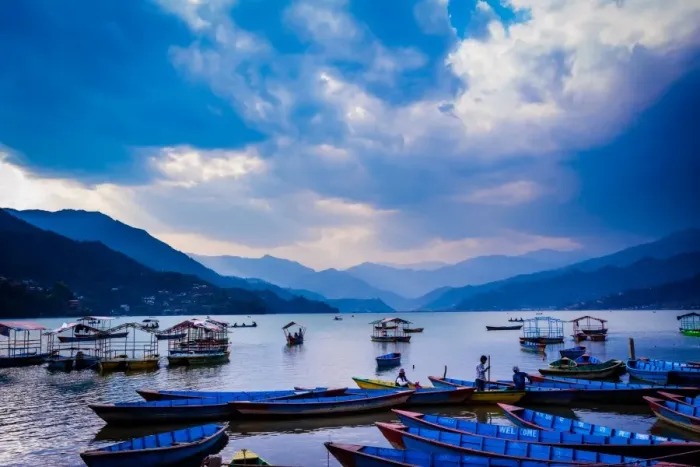Framed Print : Boats docked on a lake at sunset in Pokhara, Nepal, Asia Framed Print : Boats docked on a lake at sunset in Pokhara, Nepal, Asia