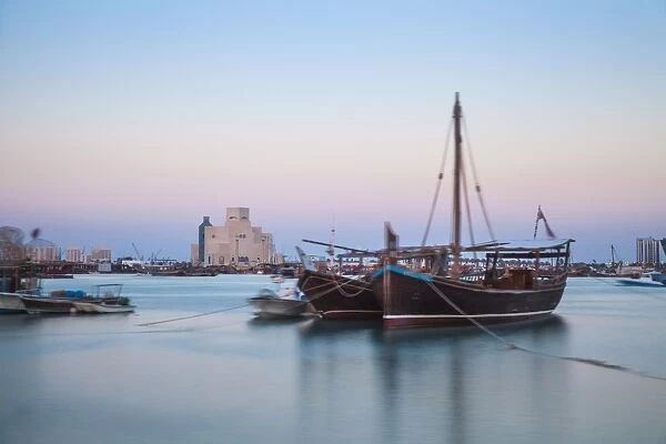 Boats in Doha Bay and Museum of Islamic Art, Doha, Qatar, Middle East