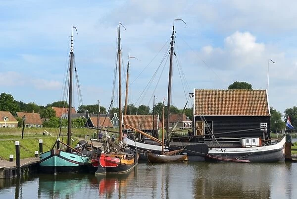 Boats in a fishing port at Zuiderzee Open Air Museum, Lake Ijssel, Enkhuizen, North Holland, Netherlands, Europe