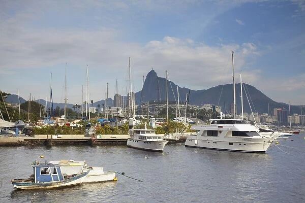 Boats in Guanabara Bay with Christ the Redeemer statue (Cristo Redentor) in the background, Urca, Rio de Janeiro, Brazil, South America
