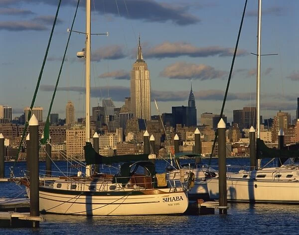 Boats in the harbour with the Empire State Building on the skyline in the background