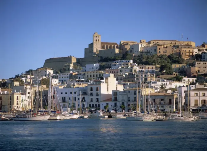 Framed Print : Boats in the harbour and the houses and church of Ibiza Town behind Framed Print : Boats in the harbour and the houses and church of Ibiza Town behind