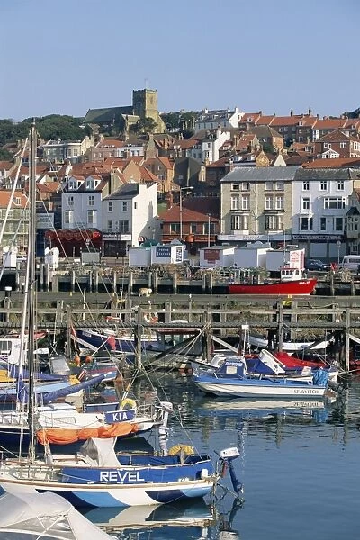 Boats in harbour and seafront, Scarborough, Yorkshire, England, United Kingdom, Europe