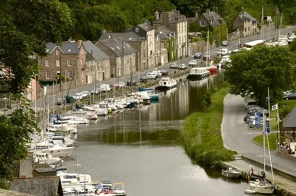Boats and houses along the Banks of the River Rance, Dinan, Cotes d Armor, Brittany, France, Europe