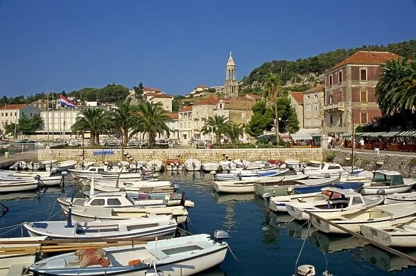 Boats in the marina and the town of Hvar on Hvar Island, Dalmatian Coast, Croatia, Europe