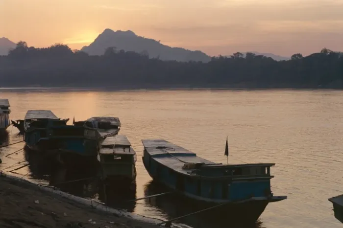 Framed Print : Boats on the Mekong River at sunset Framed Print : Boats on the Mekong River at sunset
