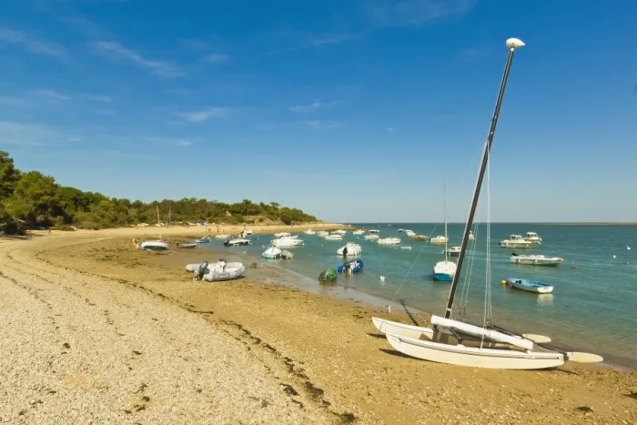 Framed Print : Boats moored in the entrance to Fier d Ars by the beach at La Patache, Les Portes-en-Re Framed Print : Boats moored in the entrance to Fier d Ars by the beach at La Patache, Les Portes-en-Re