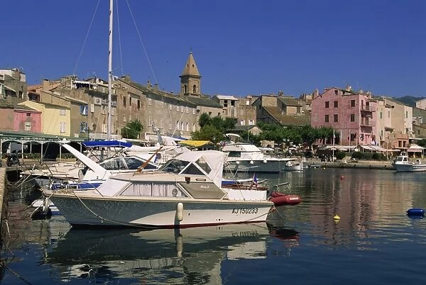 Boats moored in harbour at St. Florent, Corsica, France, Mediterranean, Europe