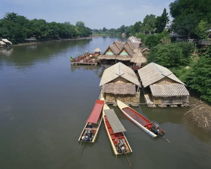 Framed Print : Boats moored near a restaurant on the Kwai River in Thailand Framed Print : Boats moored near a restaurant on the Kwai River in Thailand