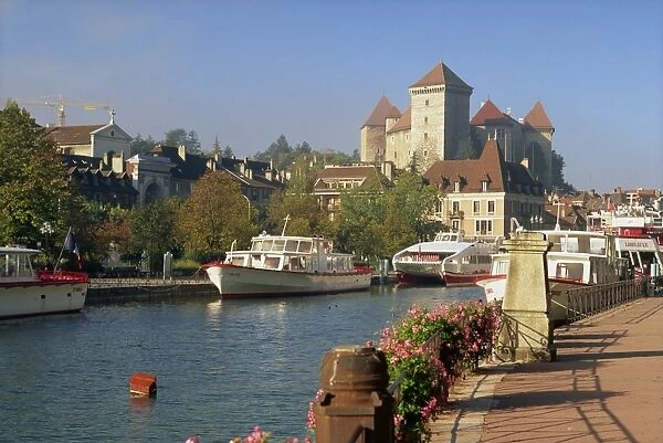 Boats moored along the river in the town of Annecy, Haute Savoie, Rhone Alpes